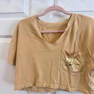 American Eagle Outfitters Tan Cropped Pocket Tee with Gold Foil Logo